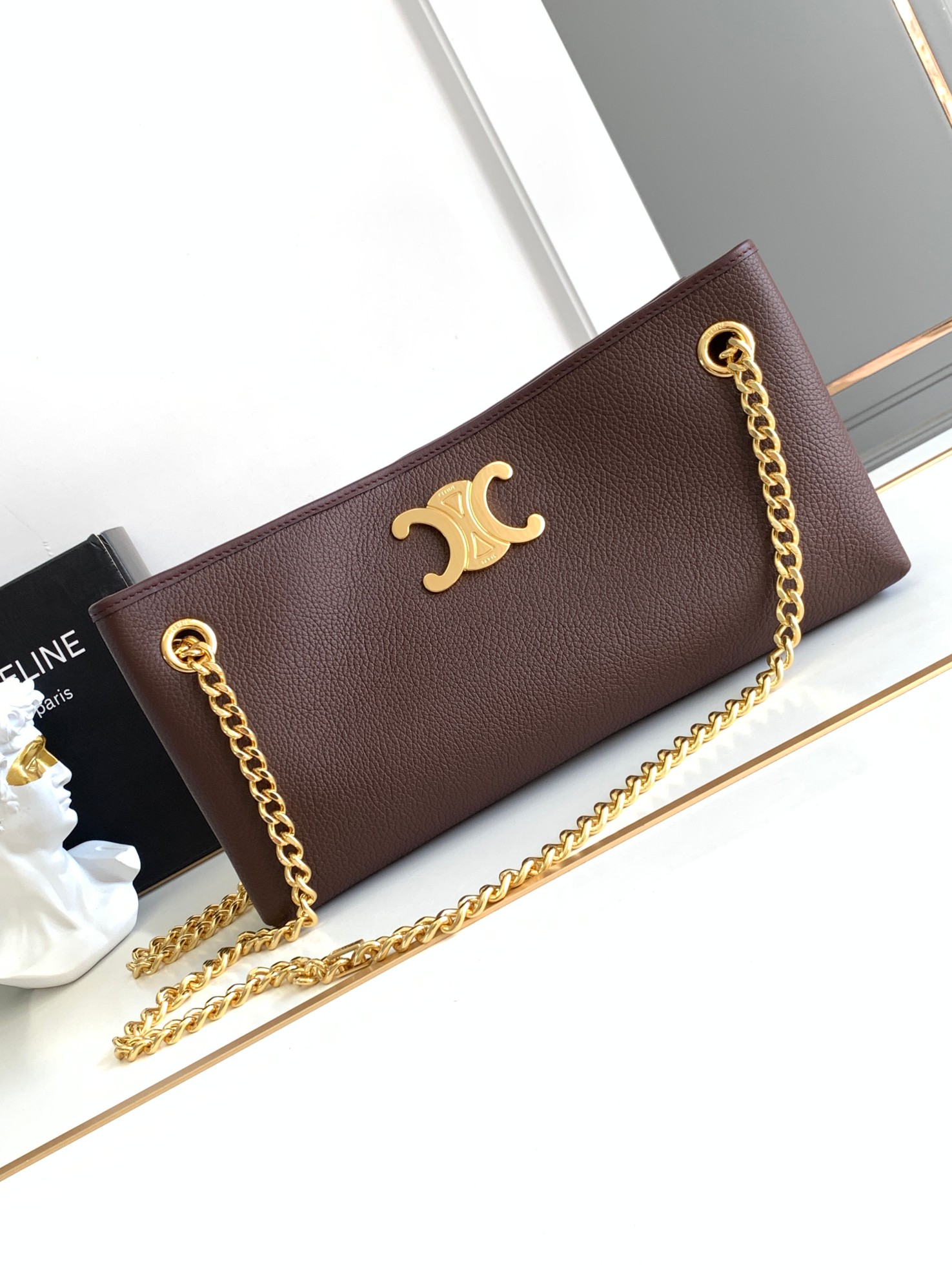 ce**e medium newspaper bag in S*pple calfskin chestnut