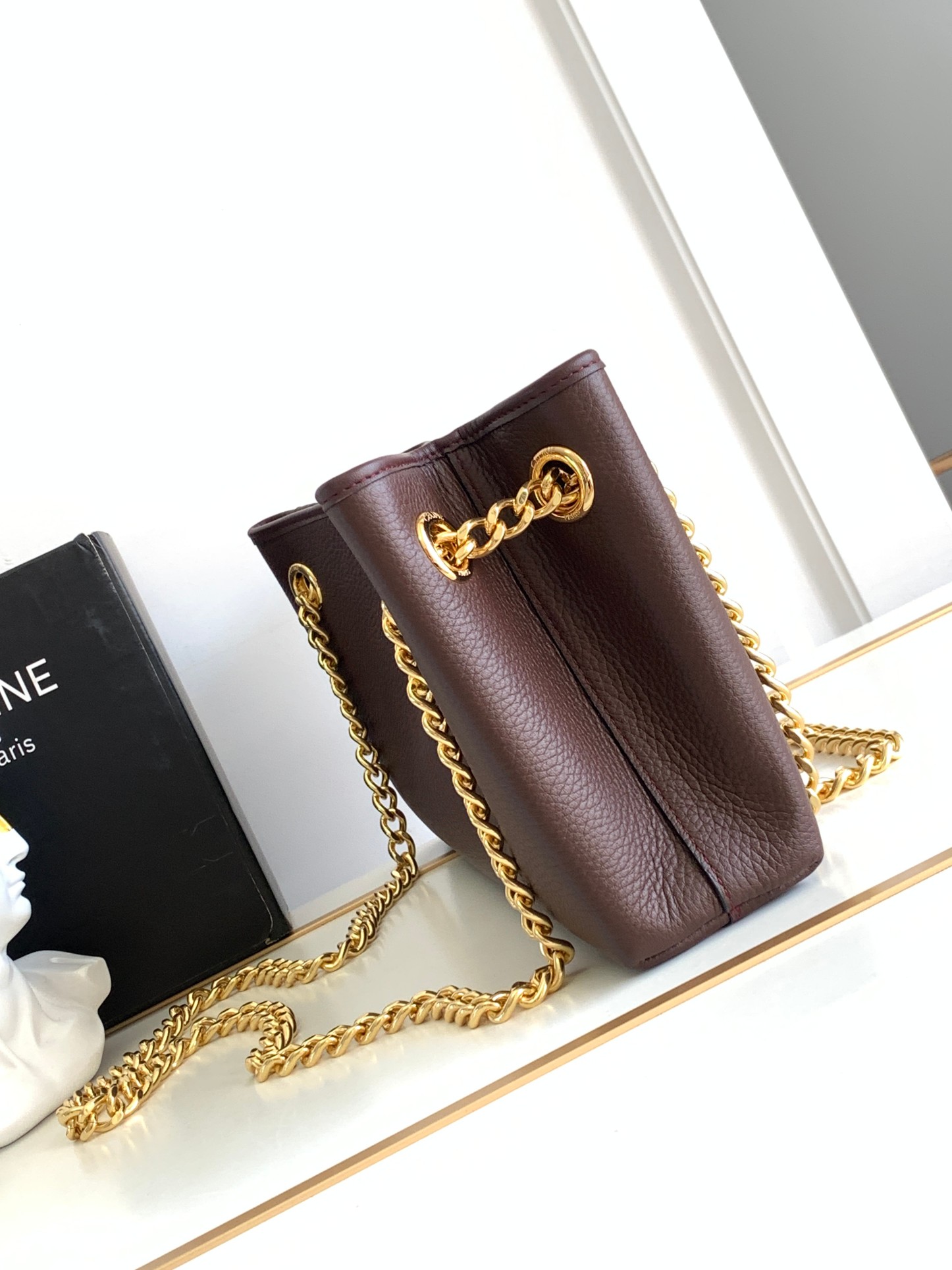 ce**e medium newspaper bag in S*pple calfskin chestnut