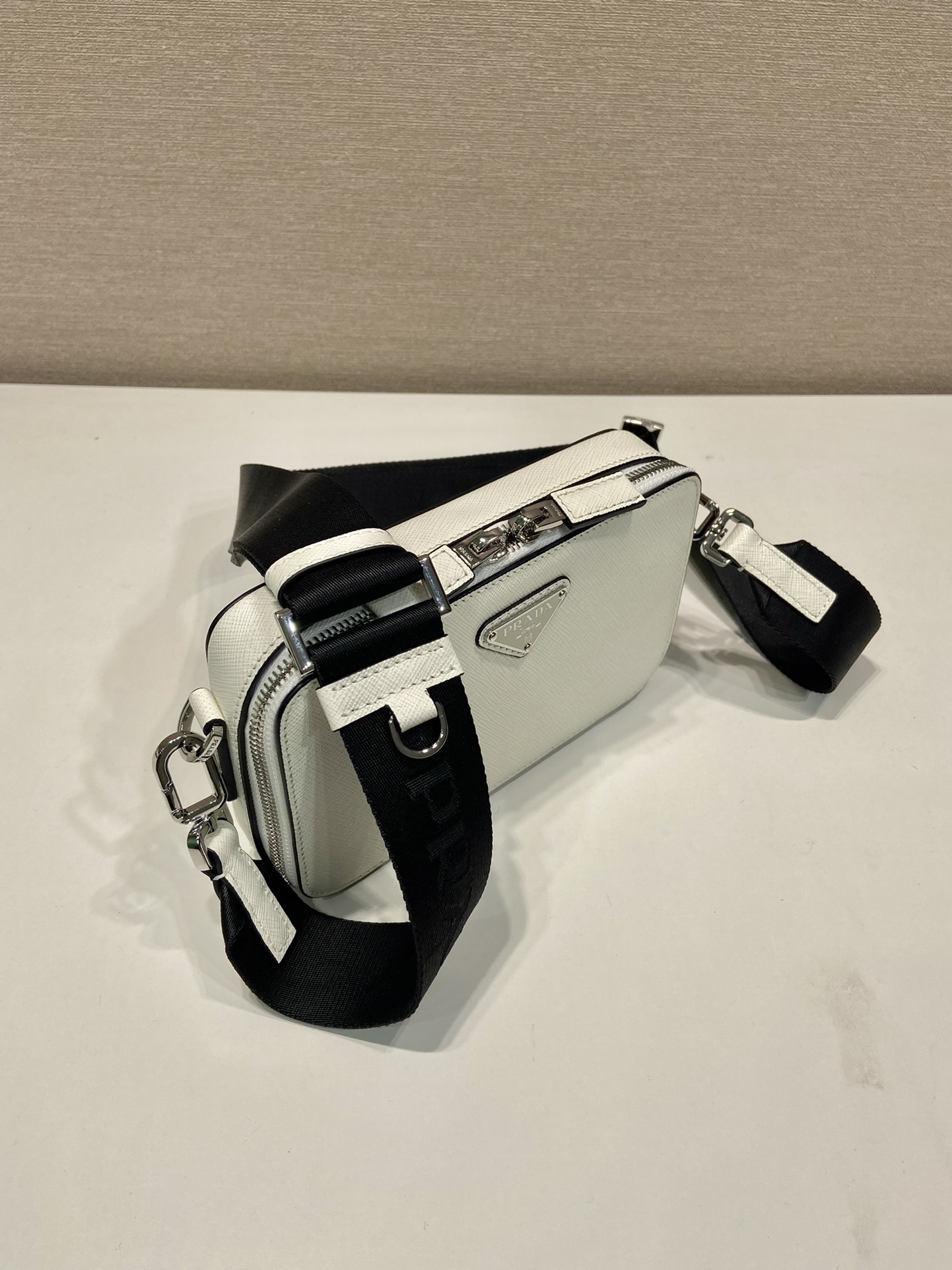 Pra*a brique saffiano leather bag
