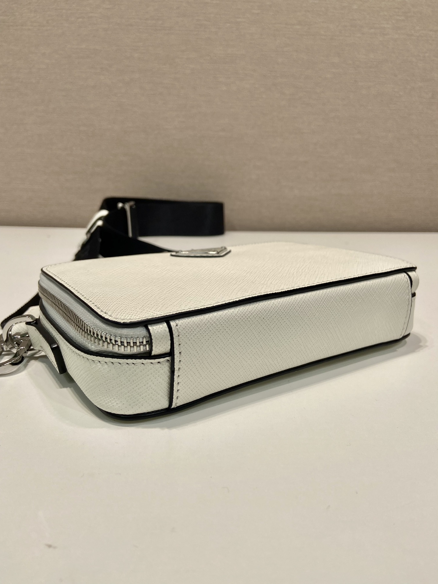 Pra*a brique saffiano leather bag