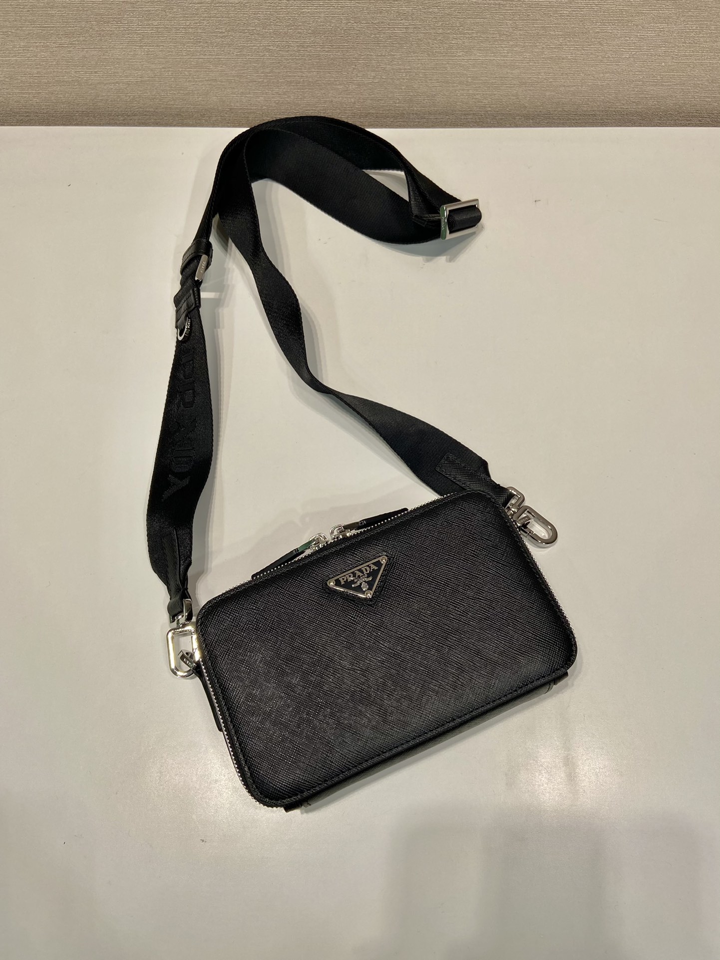 Pra*a brique saffiano leather bag