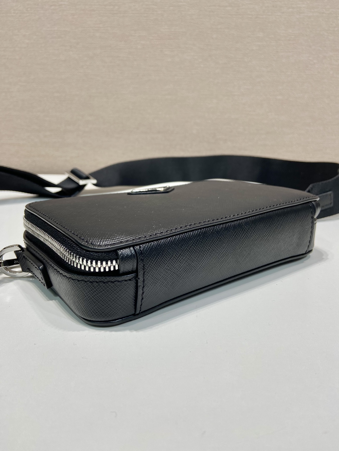 Pra*a brique saffiano leather bag