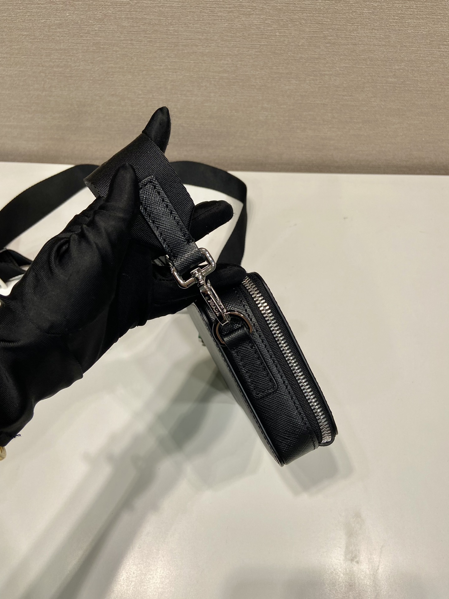 Pra*a brique saffiano leather bag
