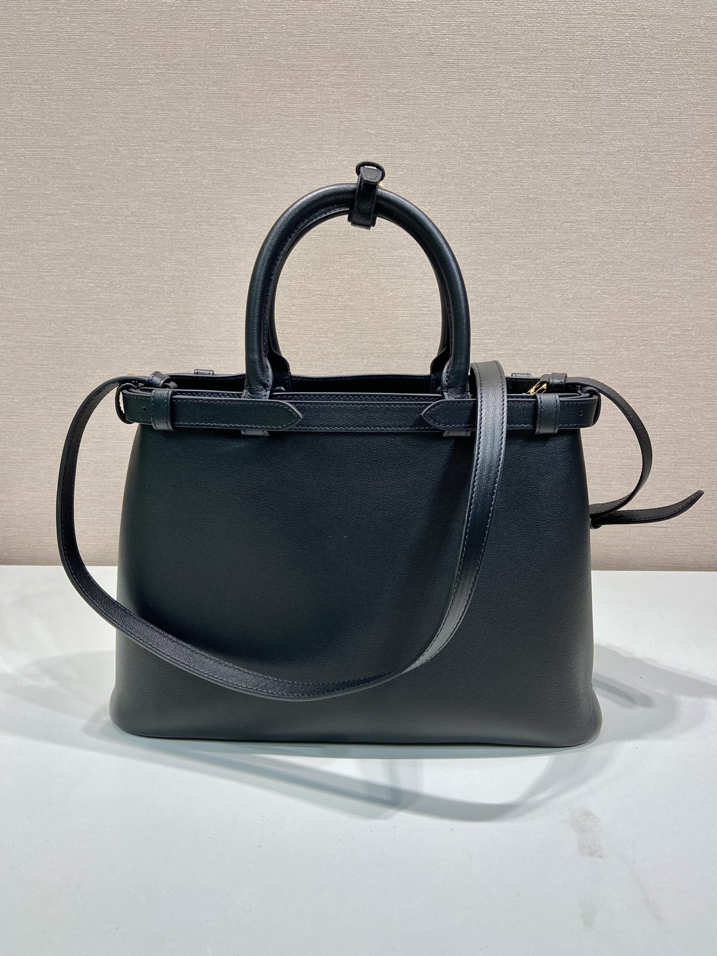 Pra*a buckle medium leather handbag with double belt