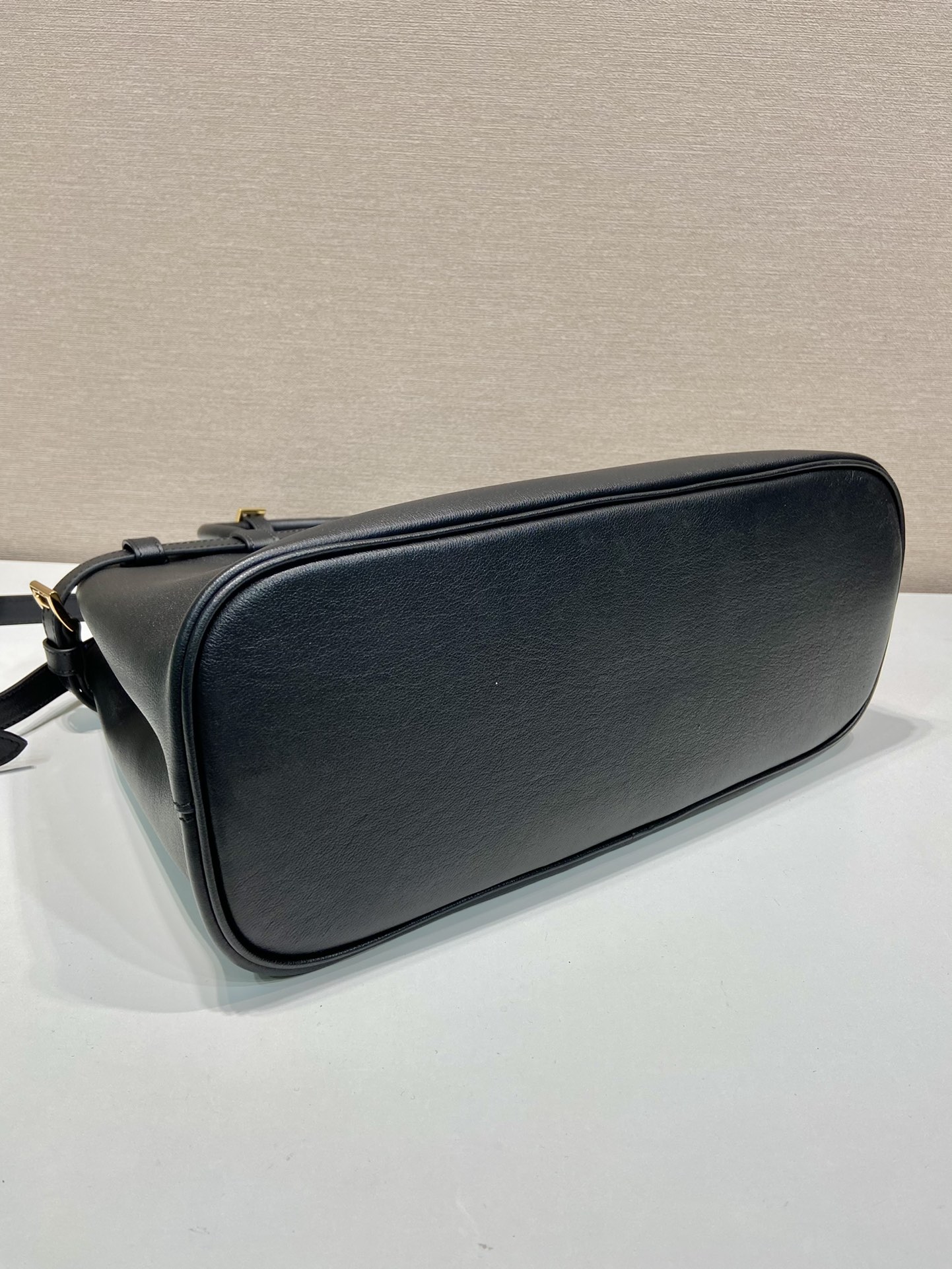 Pra*a buckle medium leather handbag with double belt