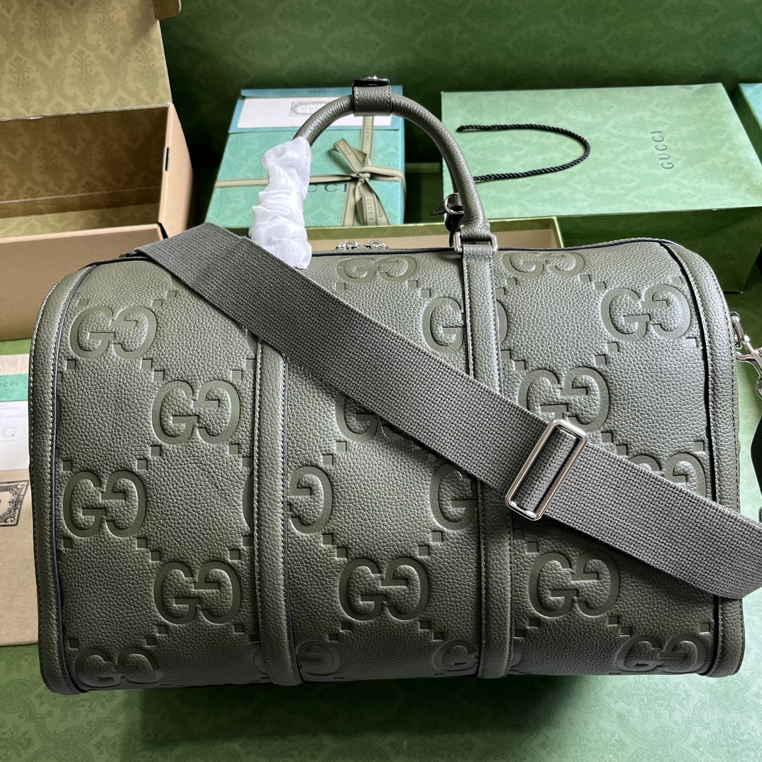 G*u*i gg duffle bag