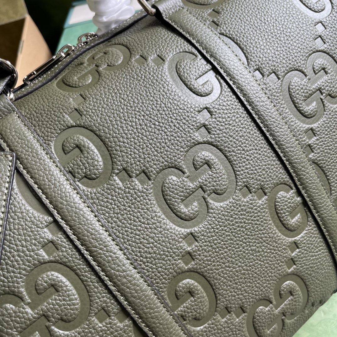 G*u*i gg duffle bag