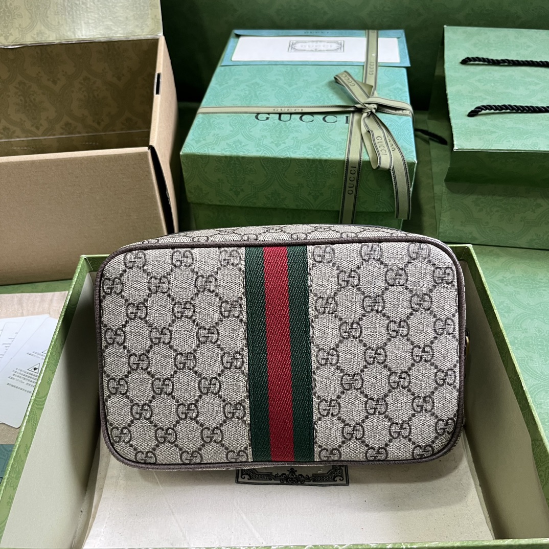 G*u*i savoy toiletry case with web