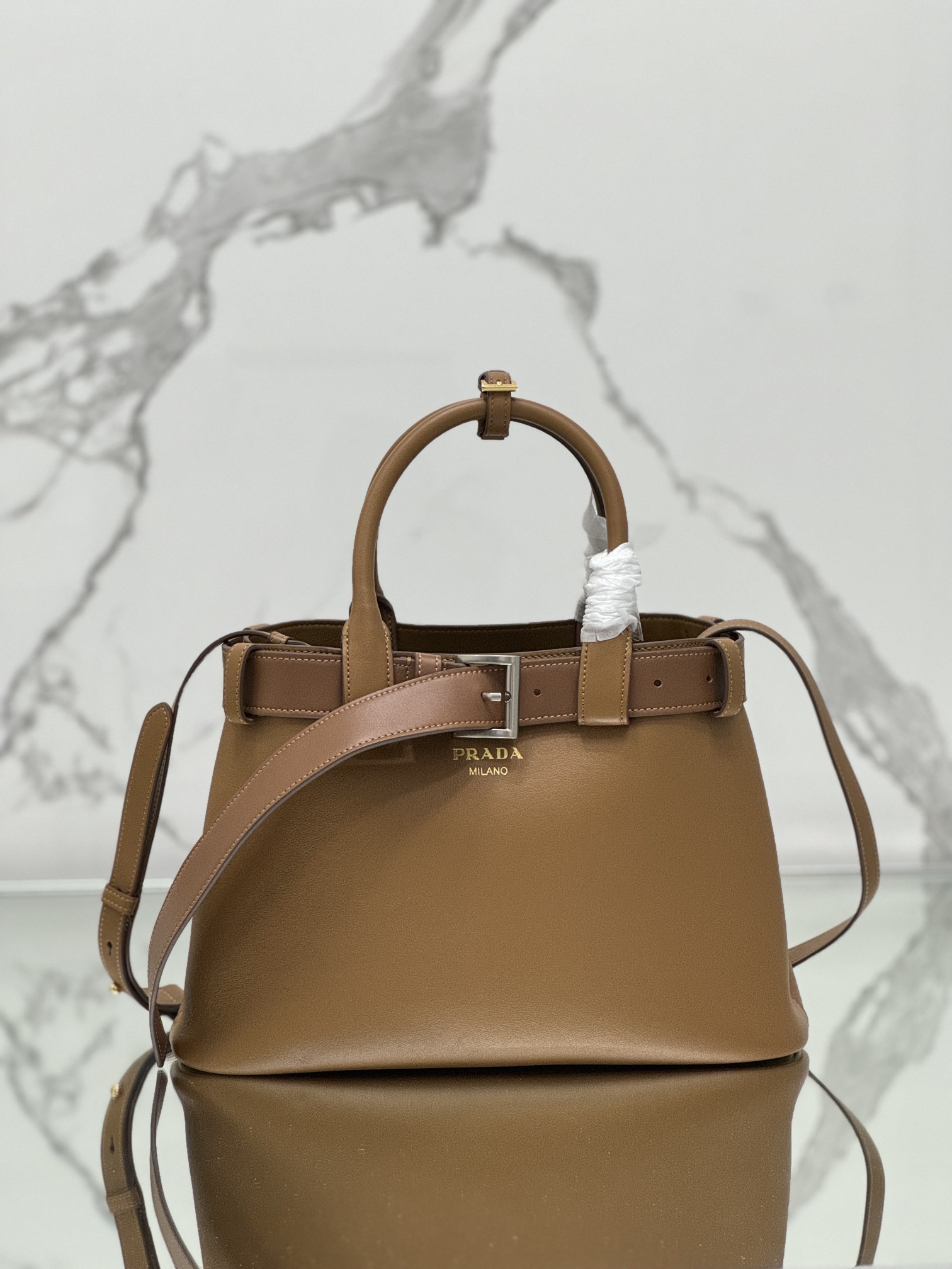 Pra*a buckle medium leather handbag with belt