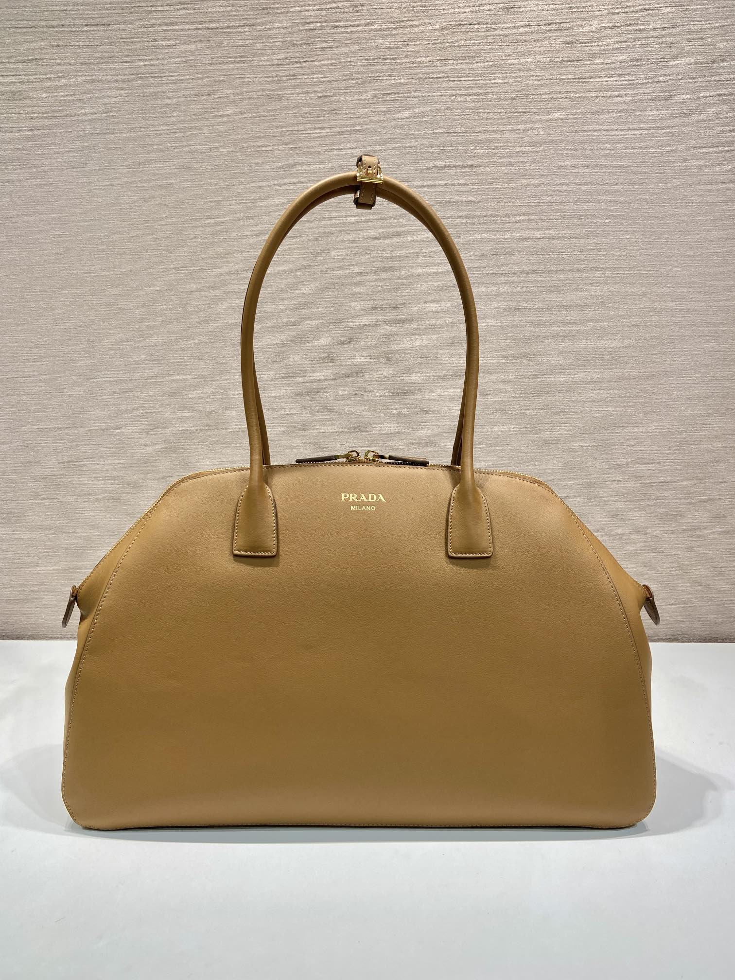 Large leather tote bag with zipper closure