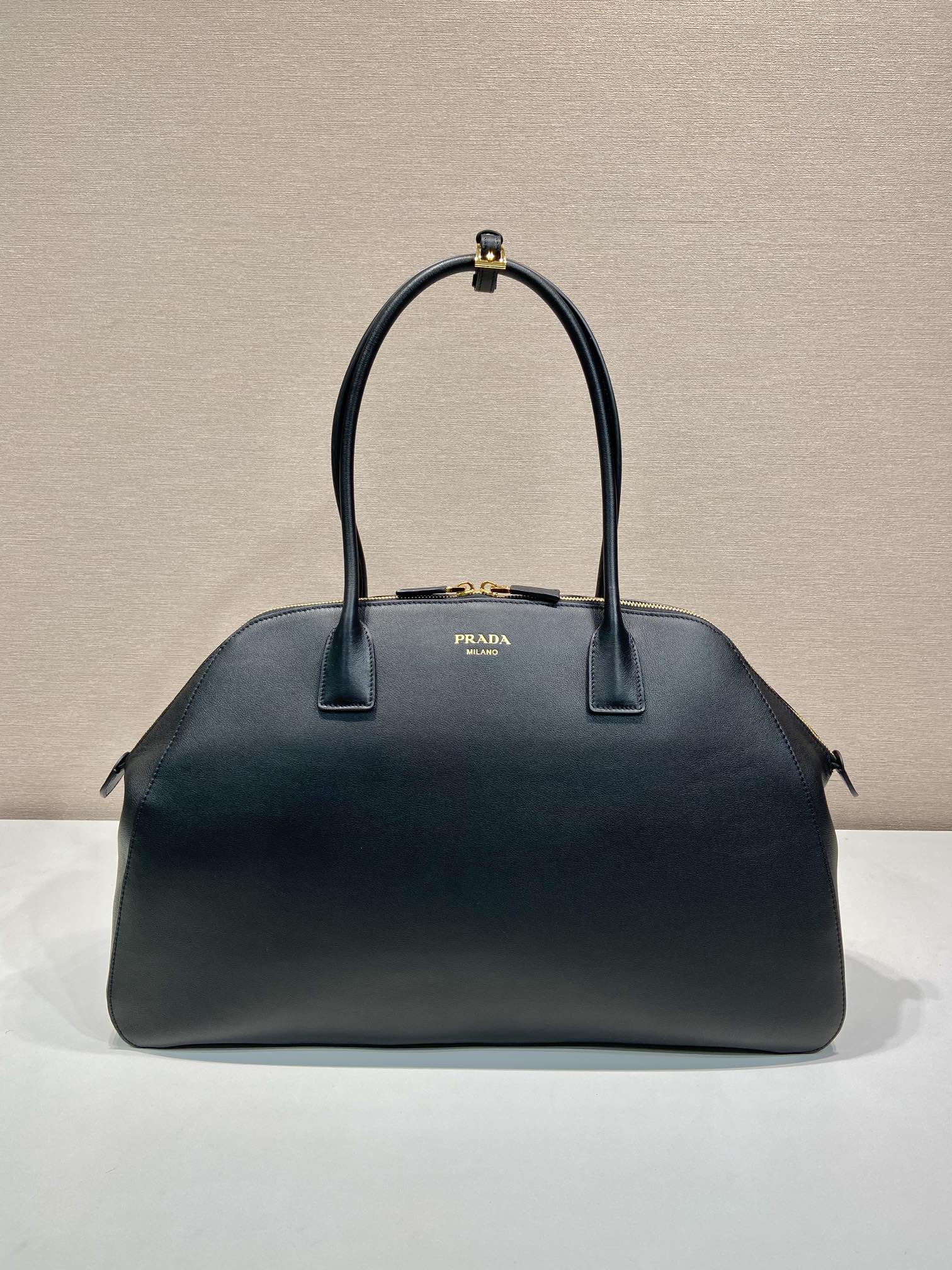 Large leather tote bag with zipper closure