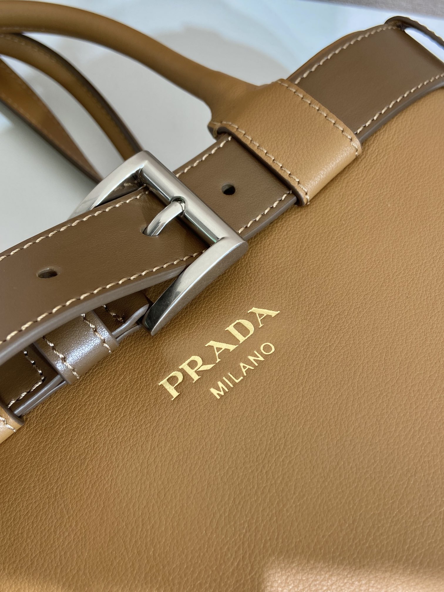 Pra*a buckle large leather handbag with belt