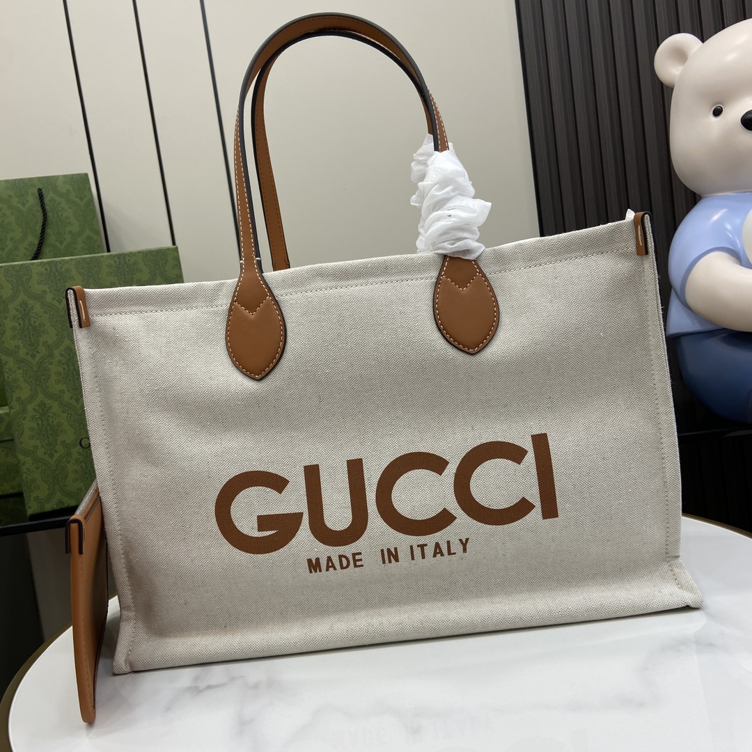 G*u*i medium tote bag with G*u*i print