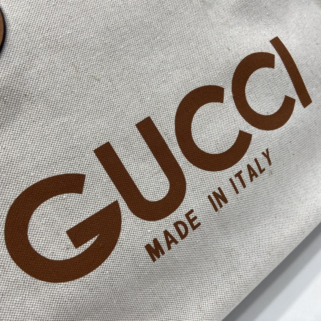 G*u*i medium tote bag with G*u*i print