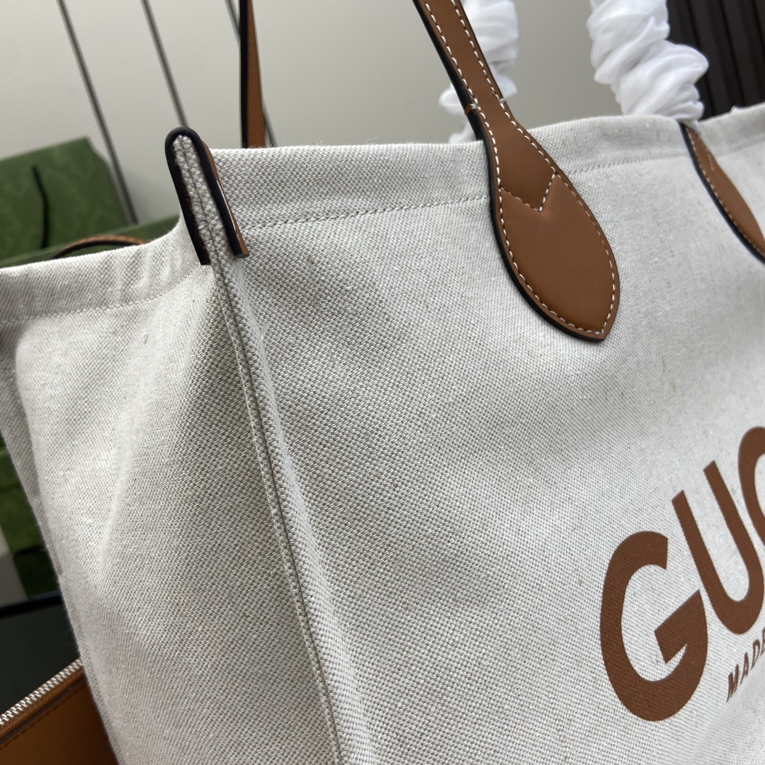 G*u*i medium tote bag with G*u*i print