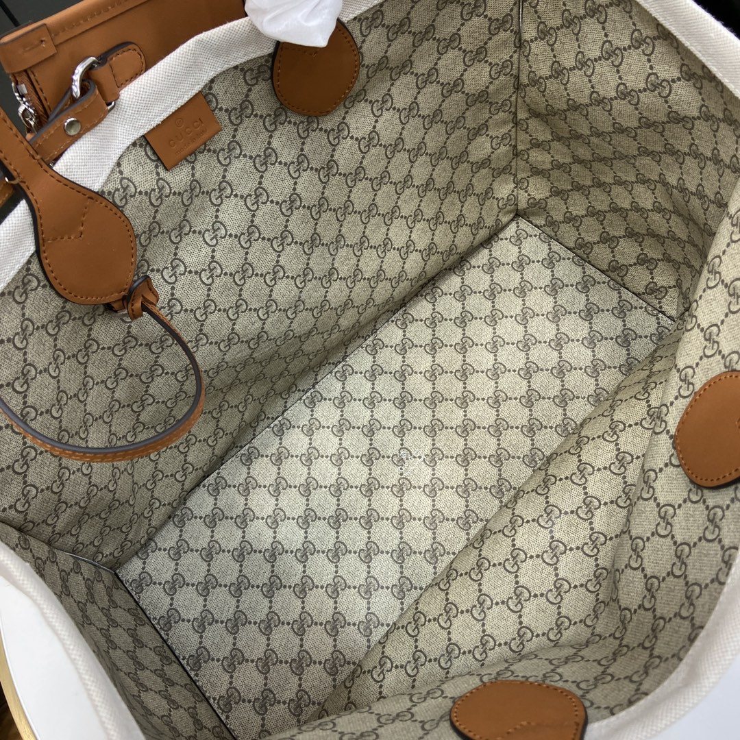 G*u*i medium tote bag with G*u*i print